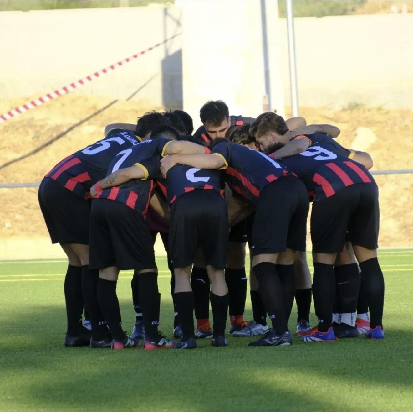 Piña del primer equipo antes del partido